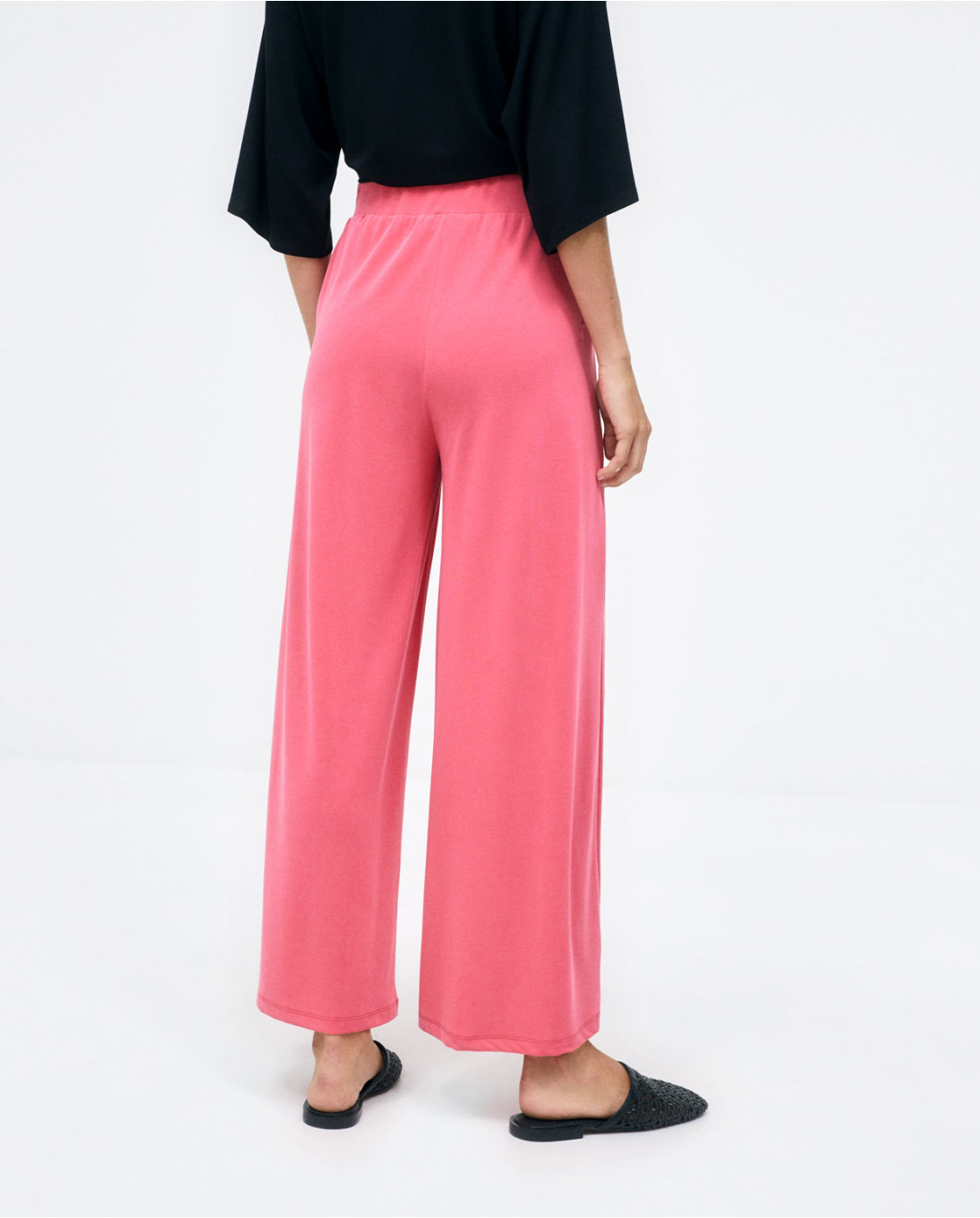 Pantaloni lunghi larghi. Elastico liscio Fucsia