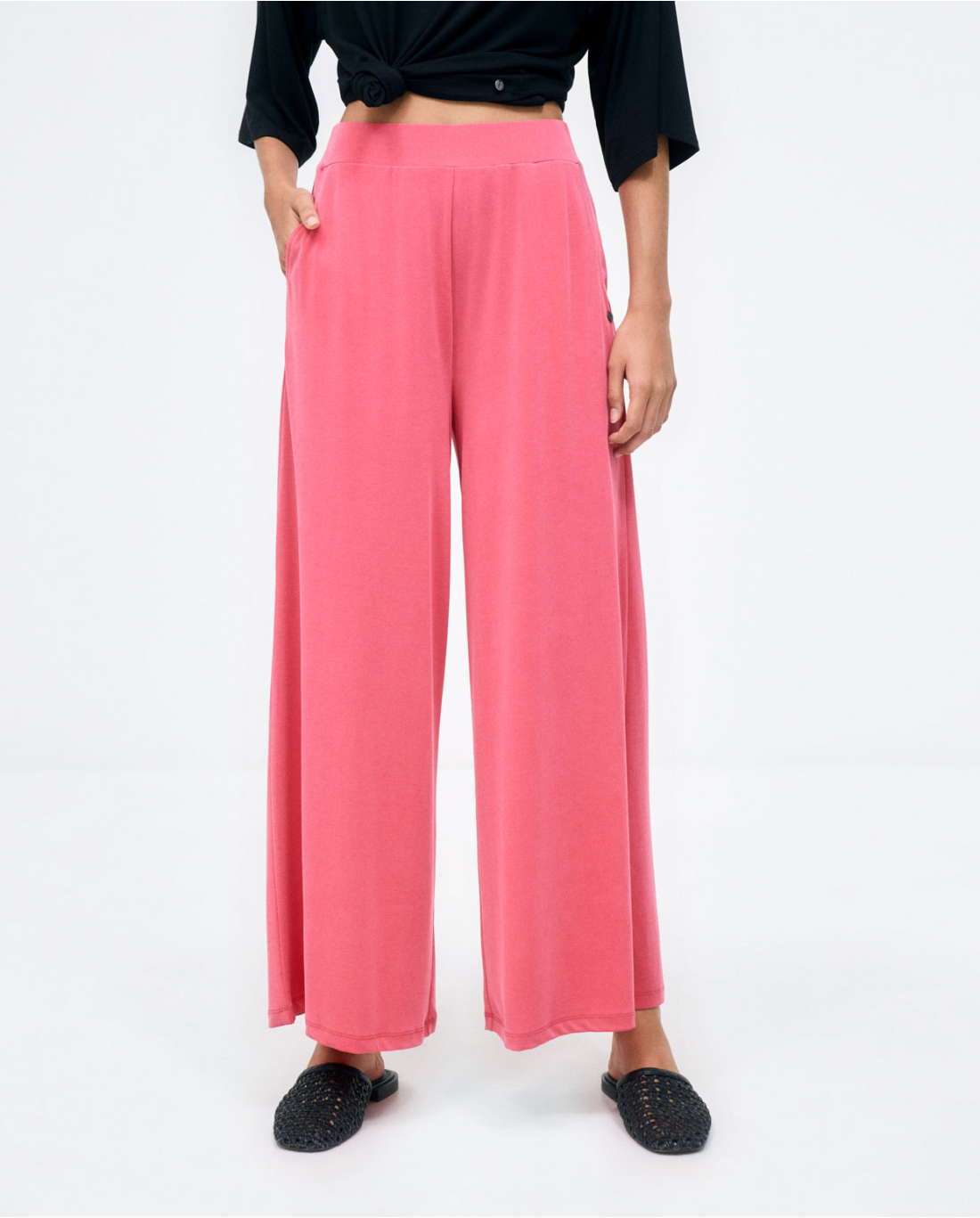 Pantaloni lunghi larghi. Elastico liscio Fucsia